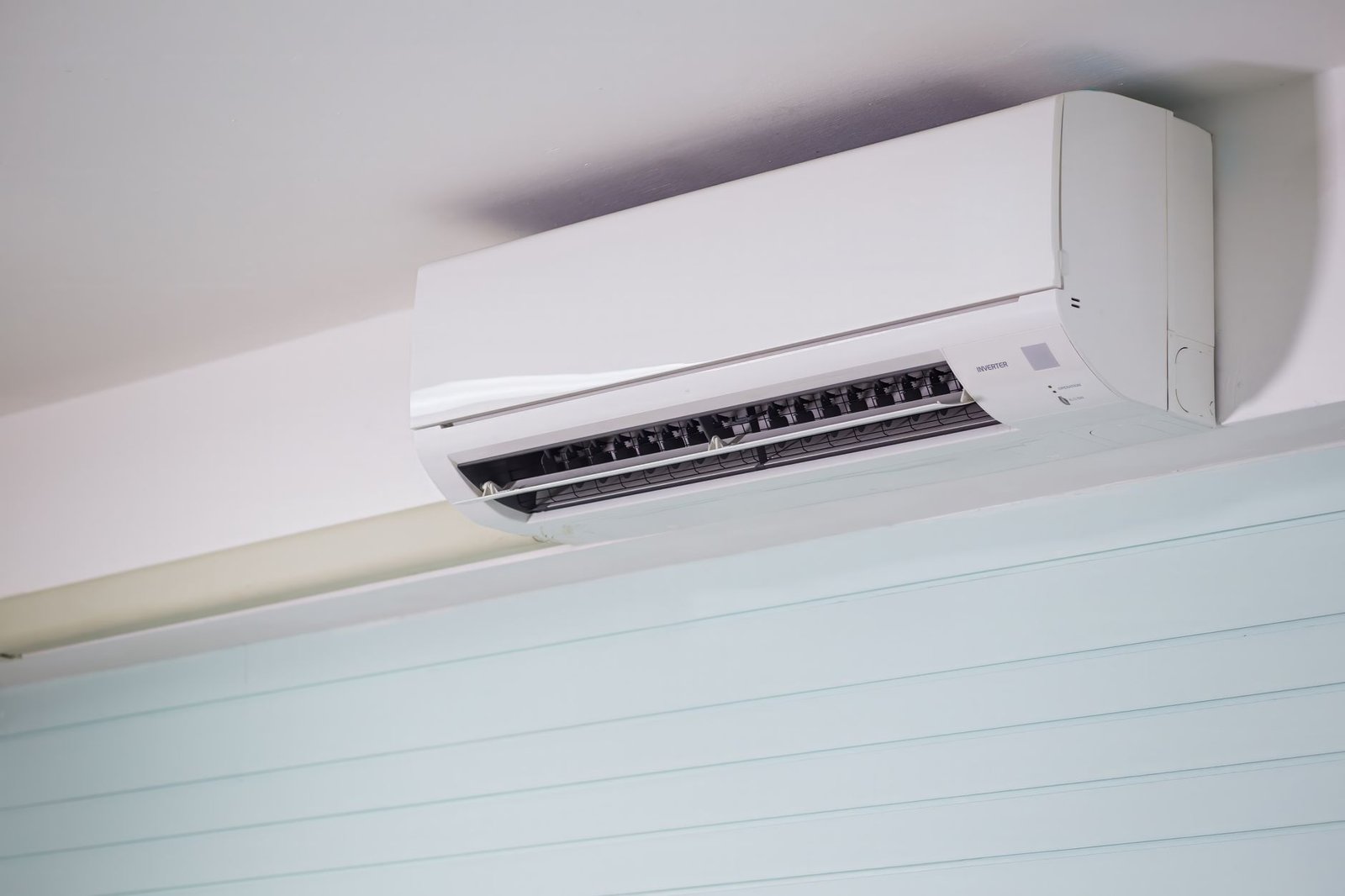 Wall-mounted ductless mini-split indoor unit in a modern interior